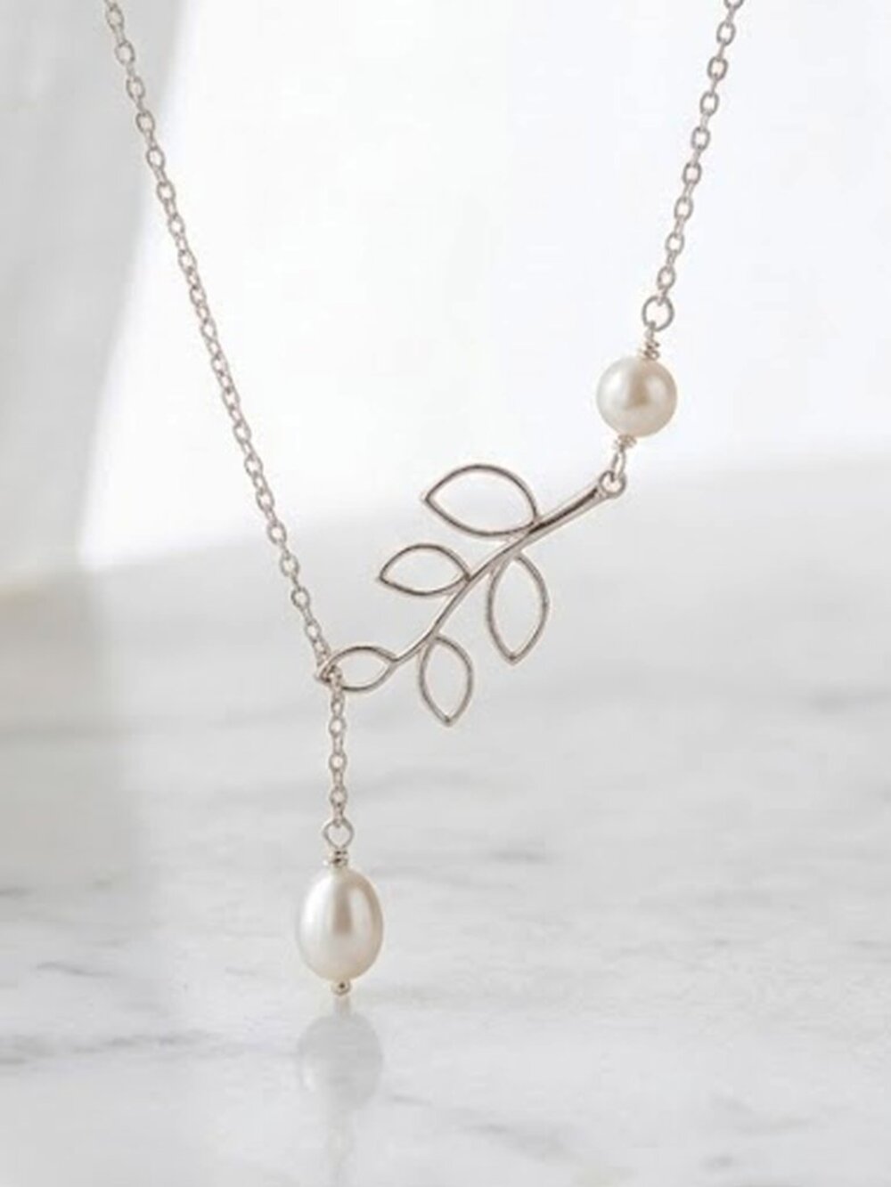 Elegant Silver Leaf Pendant Necklace with White Pearls